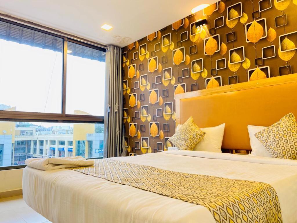 Hotel Alexa By Abc Ahmedabad Bagian luar foto